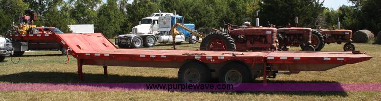 image for item A2303 1984 shop built 35' trailer with hydraulic tail