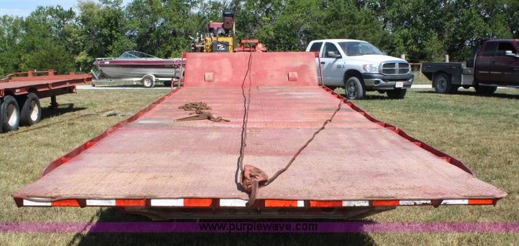 image for item A2303 1984 shop built 35' trailer with hydraulic tail