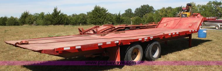 image for item A2303 1984 shop built 35' trailer with hydraulic tail