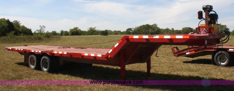 image for item A2303 1984 shop built 35' trailer with hydraulic tail