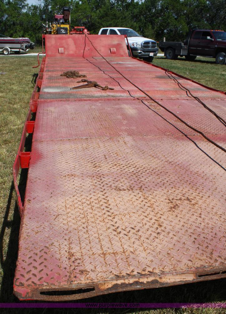 image for item A2303 1984 shop built 35' trailer with hydraulic tail