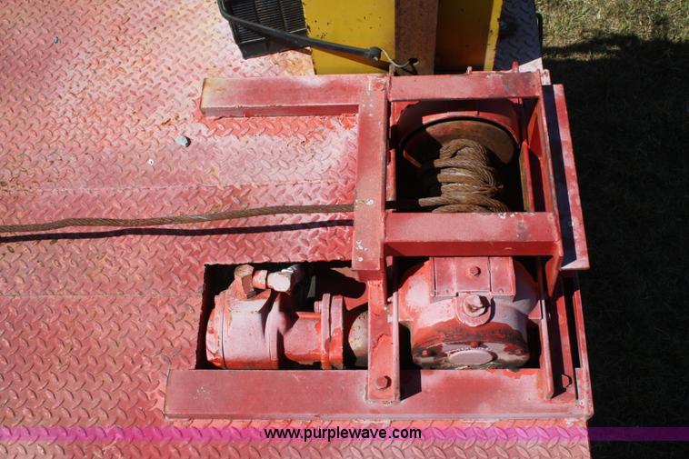 image for item A2303 1984 shop built 35' trailer with hydraulic tail