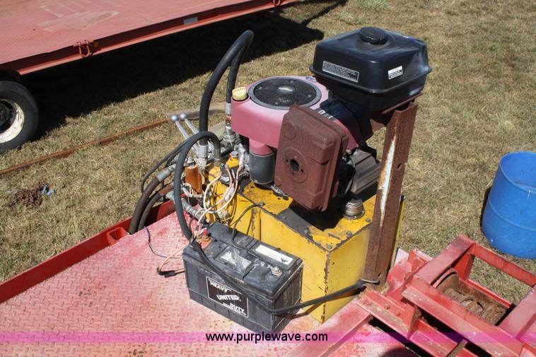 image for item A2303 1984 shop built 35' trailer with hydraulic tail