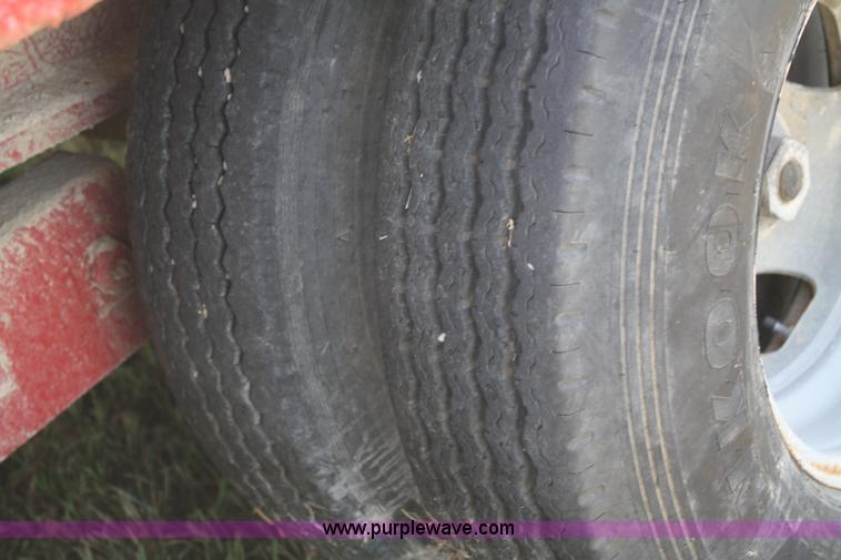 image for item A2303 1984 shop built 35' trailer with hydraulic tail