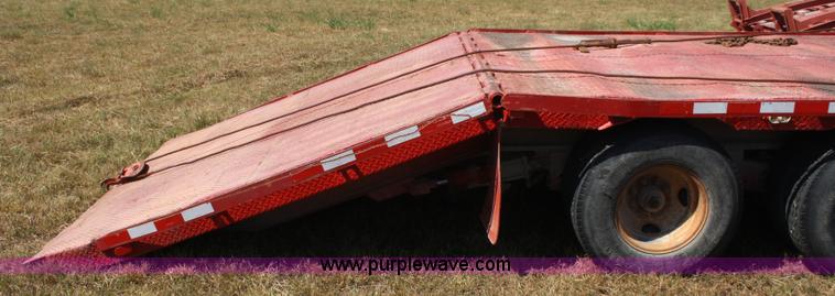image for item A2303 1984 shop built 35' trailer with hydraulic tail