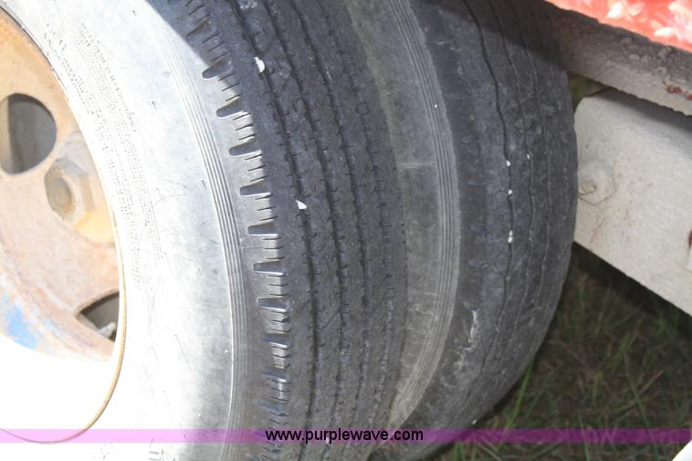 image for item A2303 1984 shop built 35' trailer with hydraulic tail