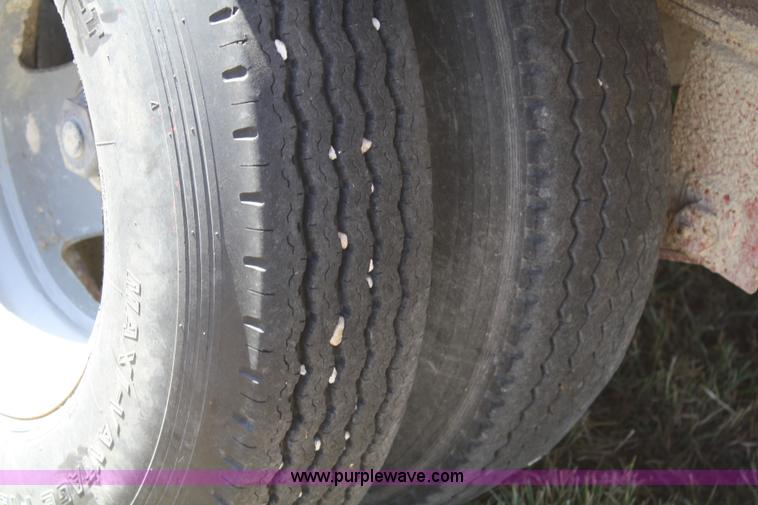 image for item A2303 1984 shop built 35' trailer with hydraulic tail