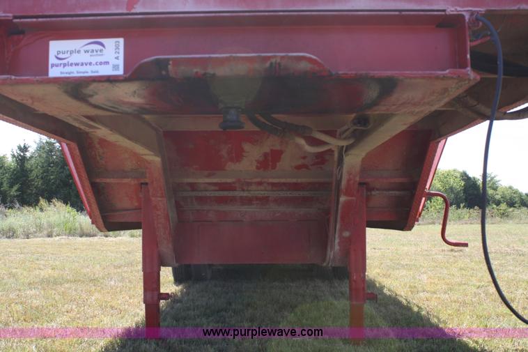 image for item A2303 1984 shop built 35' trailer with hydraulic tail