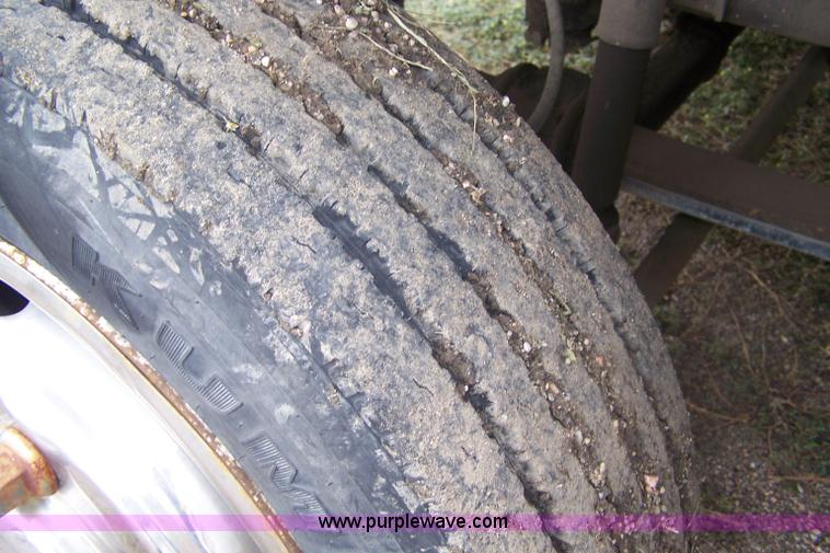 image for item A4511 1992 GMC TopKick roll back bed