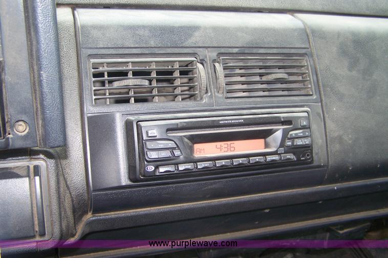 image for item A4511 1992 GMC TopKick roll back bed