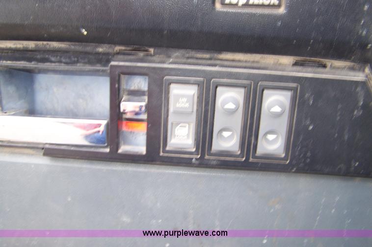 image for item A4511 1992 GMC TopKick roll back bed