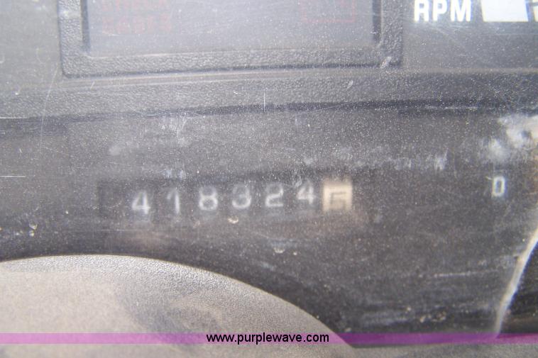 image for item A4511 1992 GMC TopKick roll back bed