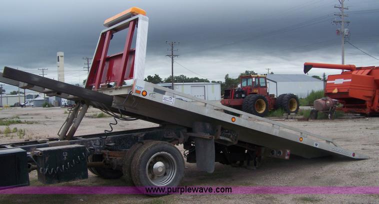 image for item A4511 1992 GMC TopKick roll back bed