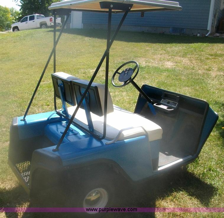 image for item A1305 EZ Go three wheel golf cart