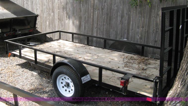 image for item A4316 2011 Liberty flatbed trailer