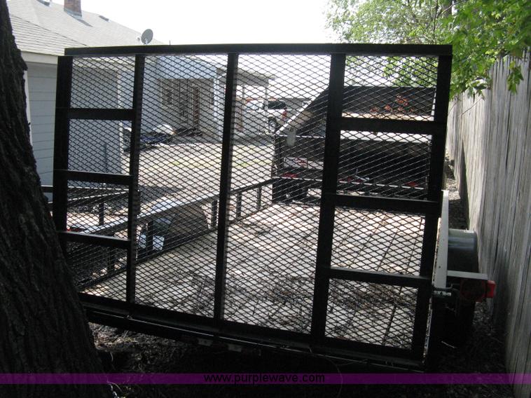 image for item A4316 2011 Liberty flatbed trailer