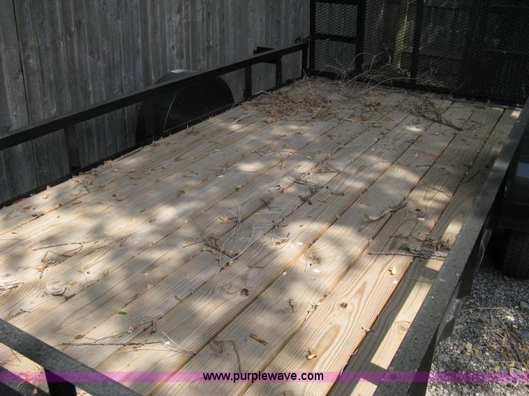 image for item A4316 2011 Liberty flatbed trailer