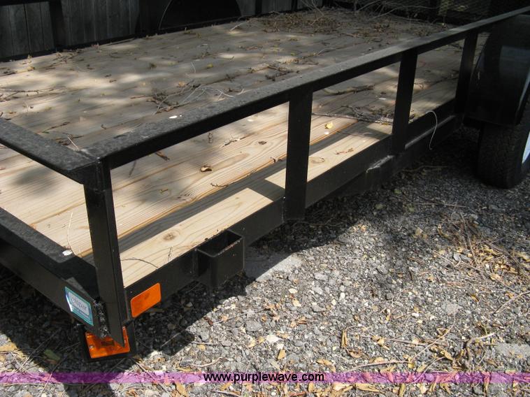 image for item A4316 2011 Liberty flatbed trailer