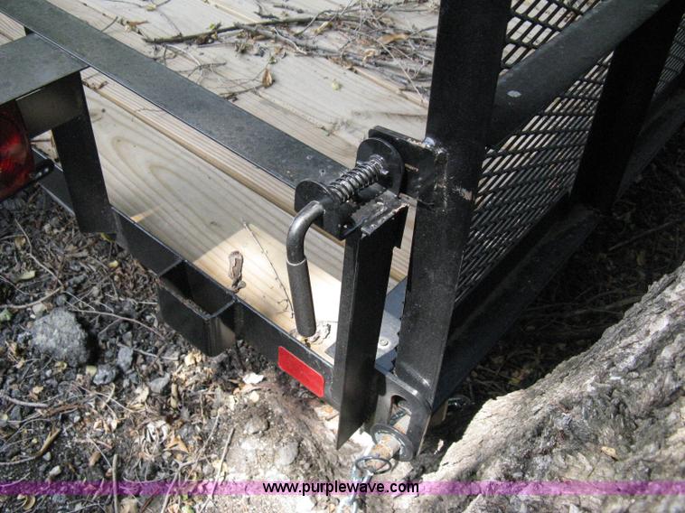 image for item A4316 2011 Liberty flatbed trailer