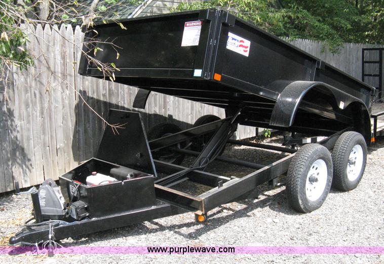 image for item A4317 2011 Liberty tandem axle dump bed trailer