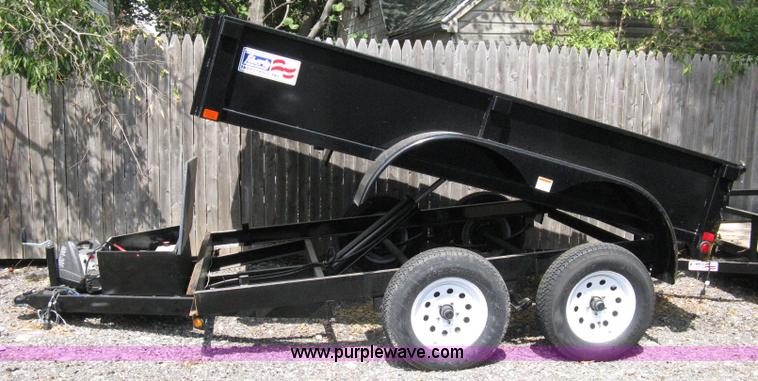 image for item A4317 2011 Liberty tandem axle dump bed trailer