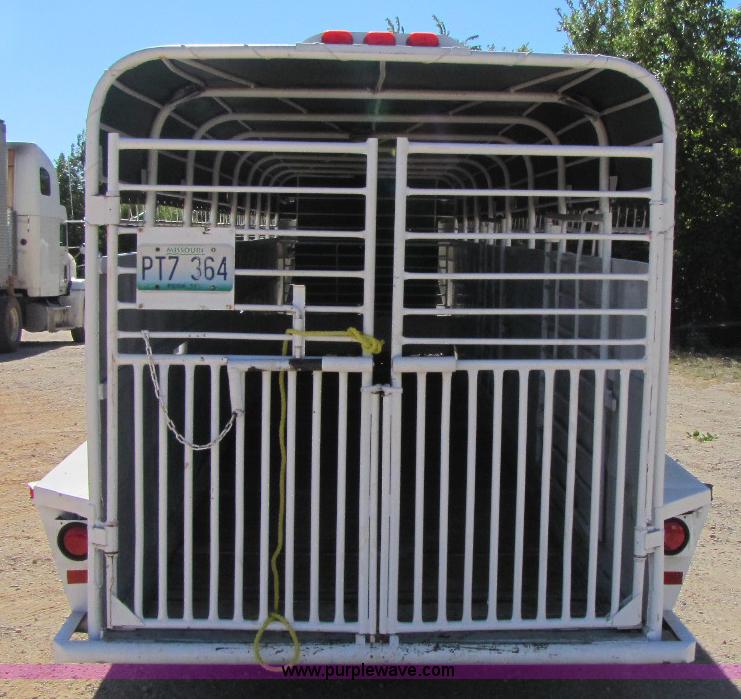 image for item A5043 1983 neck-over triple axle stock trailer