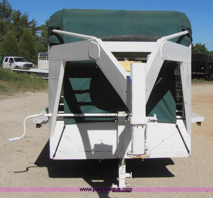 image for item A5043 1983 neck-over triple axle stock trailer