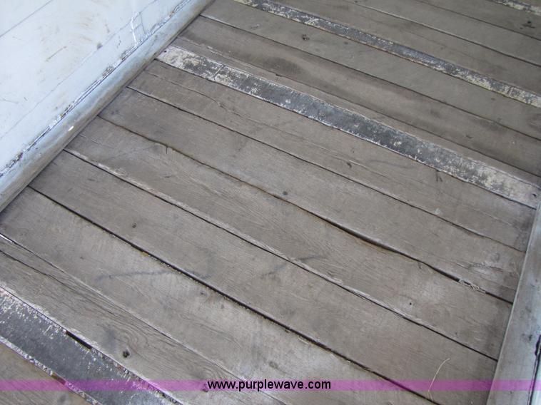 image for item A5043 1983 neck-over triple axle stock trailer