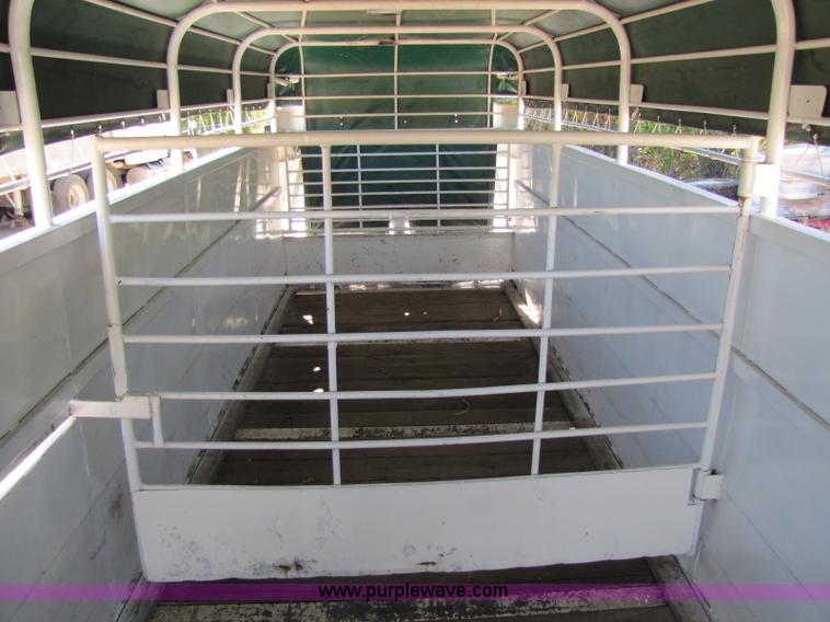 image for item A5043 1983 neck-over triple axle stock trailer