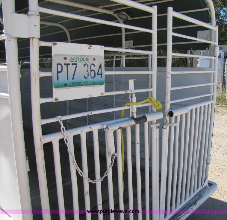 image for item A5043 1983 neck-over triple axle stock trailer