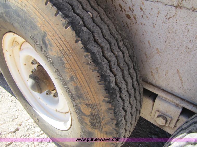 image for item A5043 1983 neck-over triple axle stock trailer