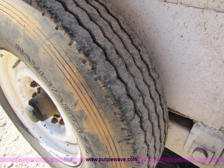 image for item A5043 1983 neck-over triple axle stock trailer