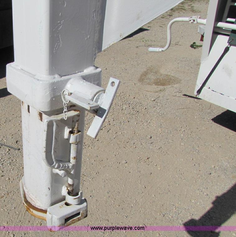 image for item A5043 1983 neck-over triple axle stock trailer