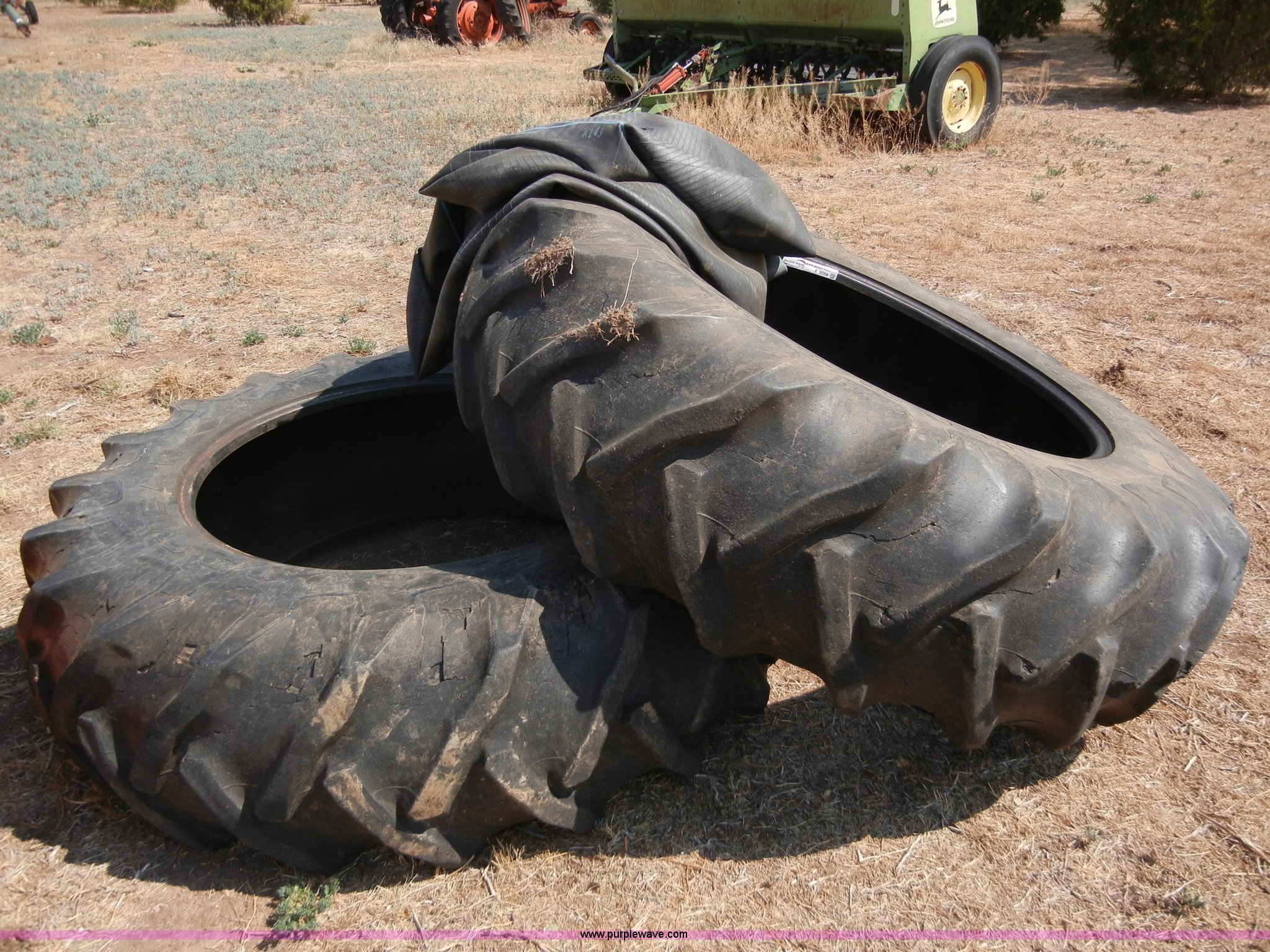 (2) 18.4x38 tires and tubes in Perryton, TX Item F9504 sold Purple Wave