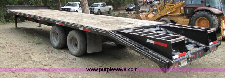 image for item A4642 2005 Elite 30' tandem axle flatbed trailer