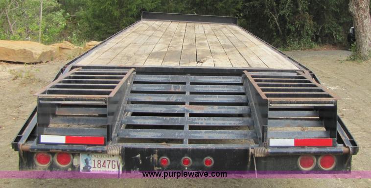 image for item A4642 2005 Elite 30' tandem axle flatbed trailer