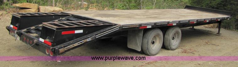 image for item A4642 2005 Elite 30' tandem axle flatbed trailer