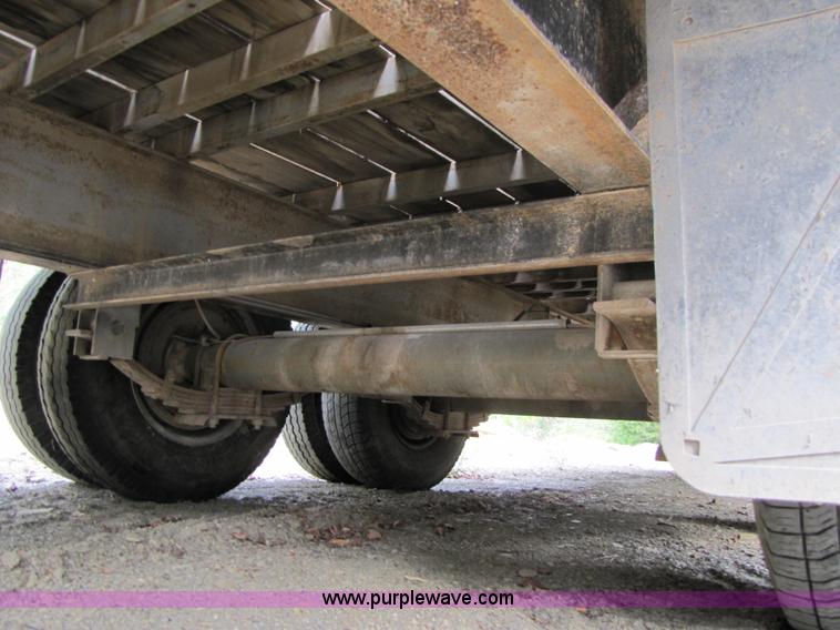 image for item A4642 2005 Elite 30' tandem axle flatbed trailer