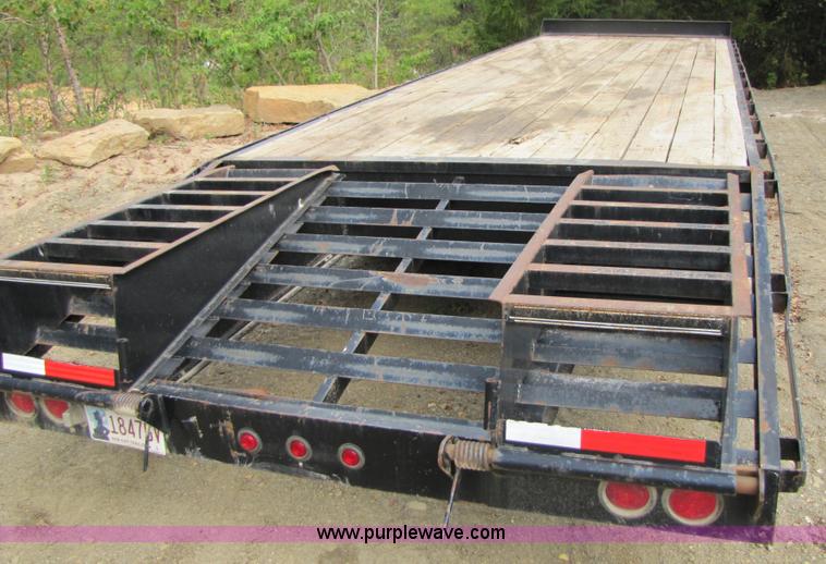image for item A4642 2005 Elite 30' tandem axle flatbed trailer