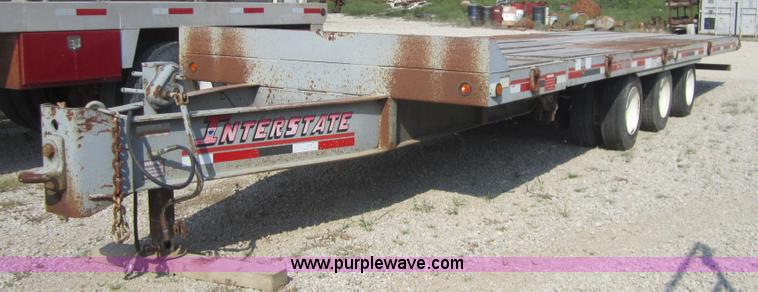 image for item A4703 2002 Interstate triple axle equipment trailer