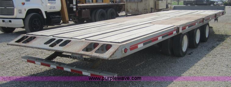 image for item A4703 2002 Interstate triple axle equipment trailer