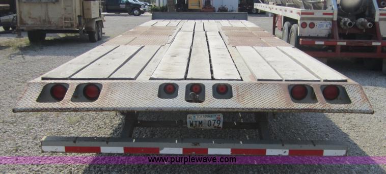 image for item A4703 2002 Interstate triple axle equipment trailer