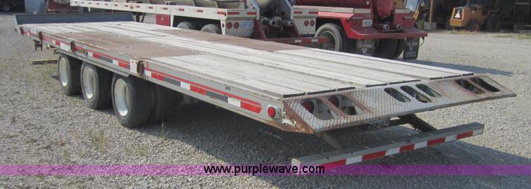 image for item A4703 2002 Interstate triple axle equipment trailer