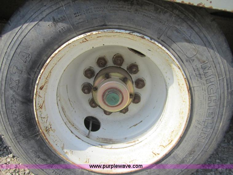 image for item A4703 2002 Interstate triple axle equipment trailer