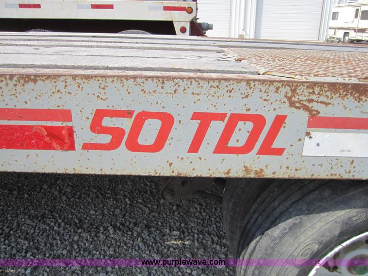 image for item A4703 2002 Interstate triple axle equipment trailer