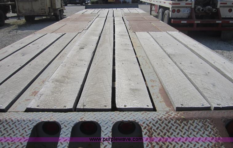 image for item A4703 2002 Interstate triple axle equipment trailer