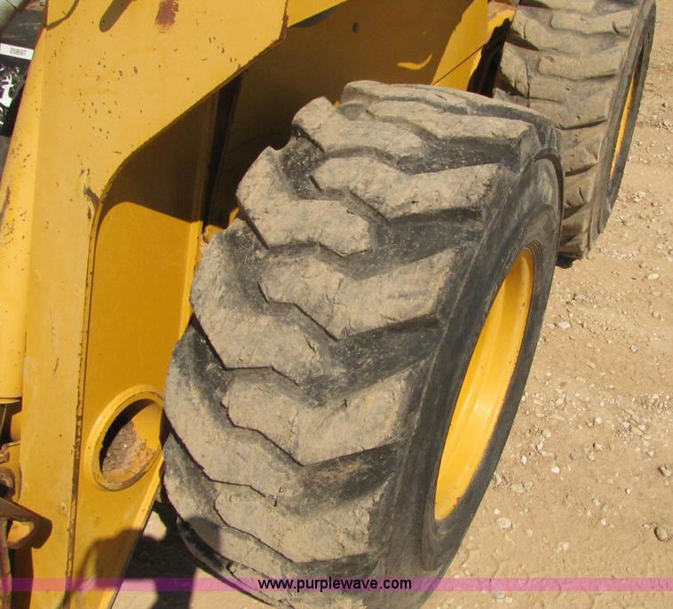 image for item A5030 2003 John Deere 280 skid steer