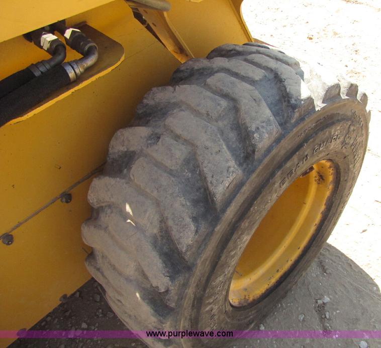 image for item A5030 2003 John Deere 280 skid steer