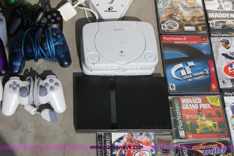 image for item A2797 Assorted Sony Playstation game consoles and more