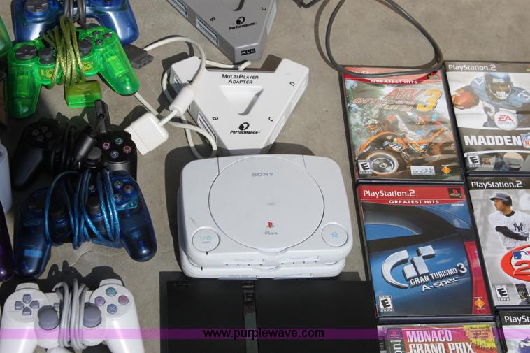 image for item A2797 Assorted Sony Playstation game consoles and more